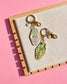 Gold zodiac keychains Gemini and Capricorn